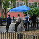 People wait in line to be vaccinated for monkeypox at the Chelsea Sexual Health Clinic in New York City.